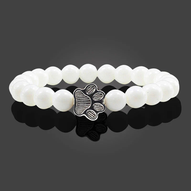 Finley - pearl bracelet with paw trailer made of natural stone