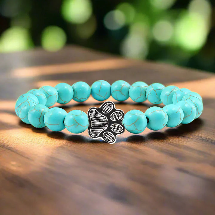 Finley - pearl bracelet with paw trailer made of natural stone